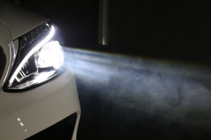 car headlights on | Alan Webb Nissan