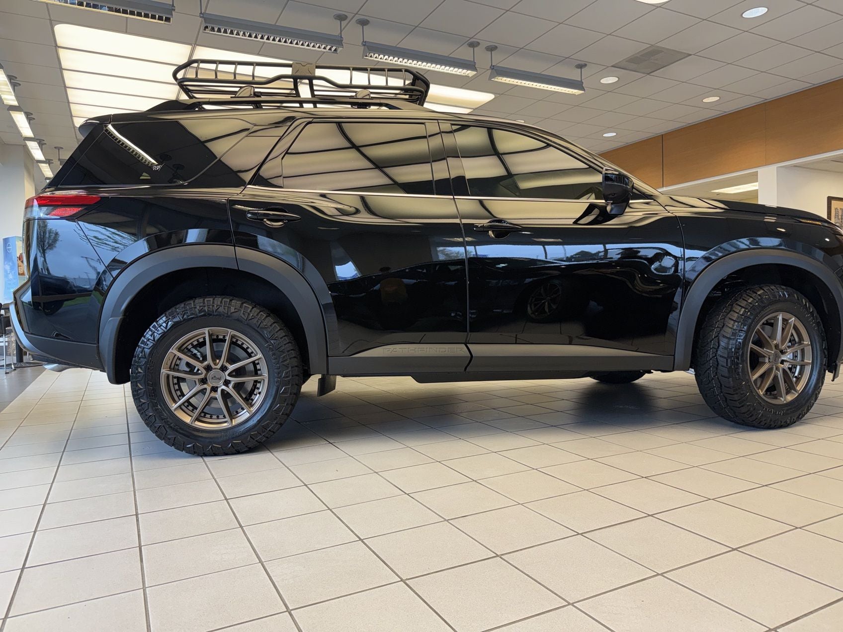 2026 Nissan Pathfinder SL "2" Lift 31" Tires 18" Wheels, Tint , Basket