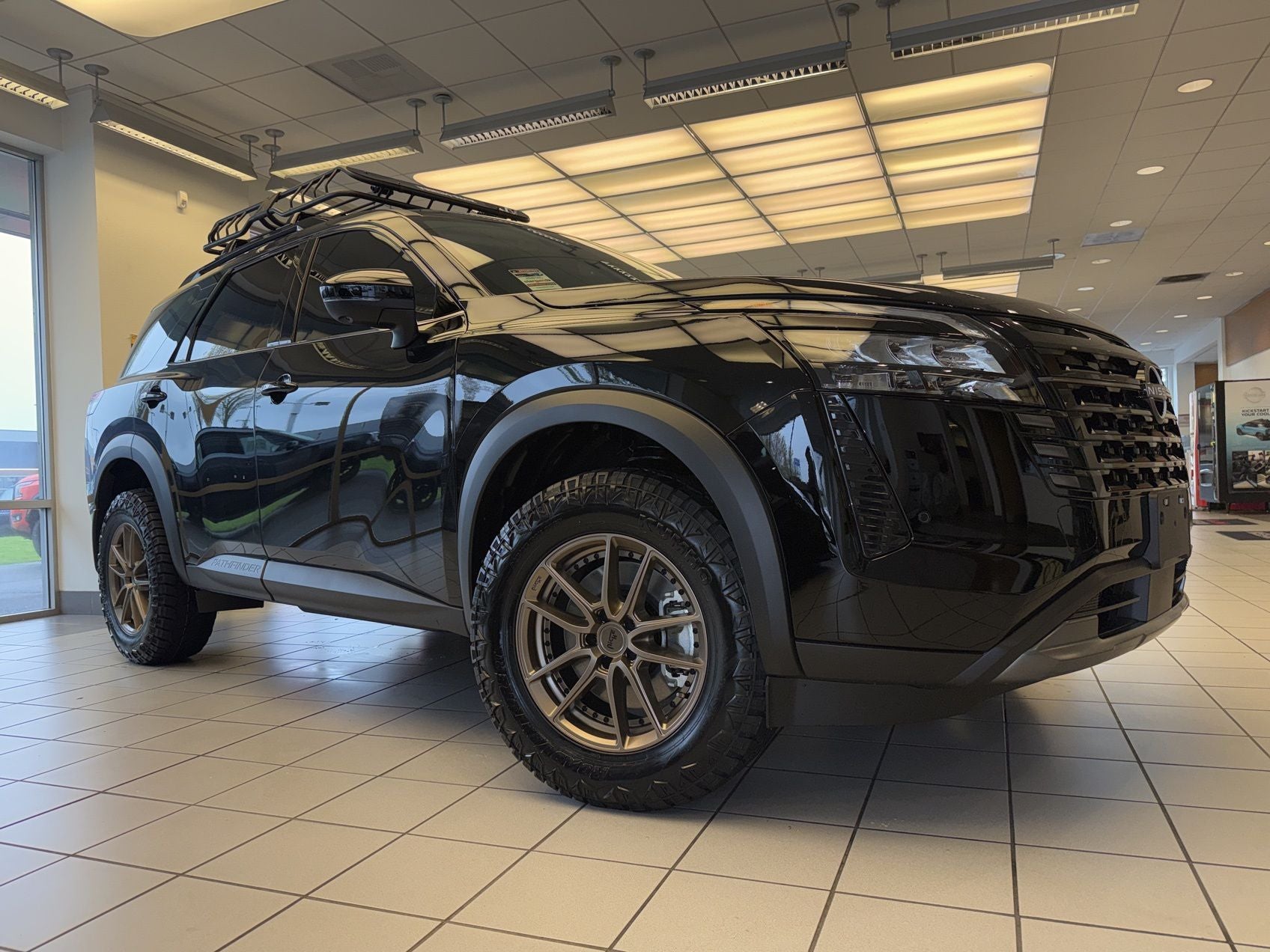 2026 Nissan Pathfinder SL "2" Lift 31" Tires 18" Wheels, Tint , Basket