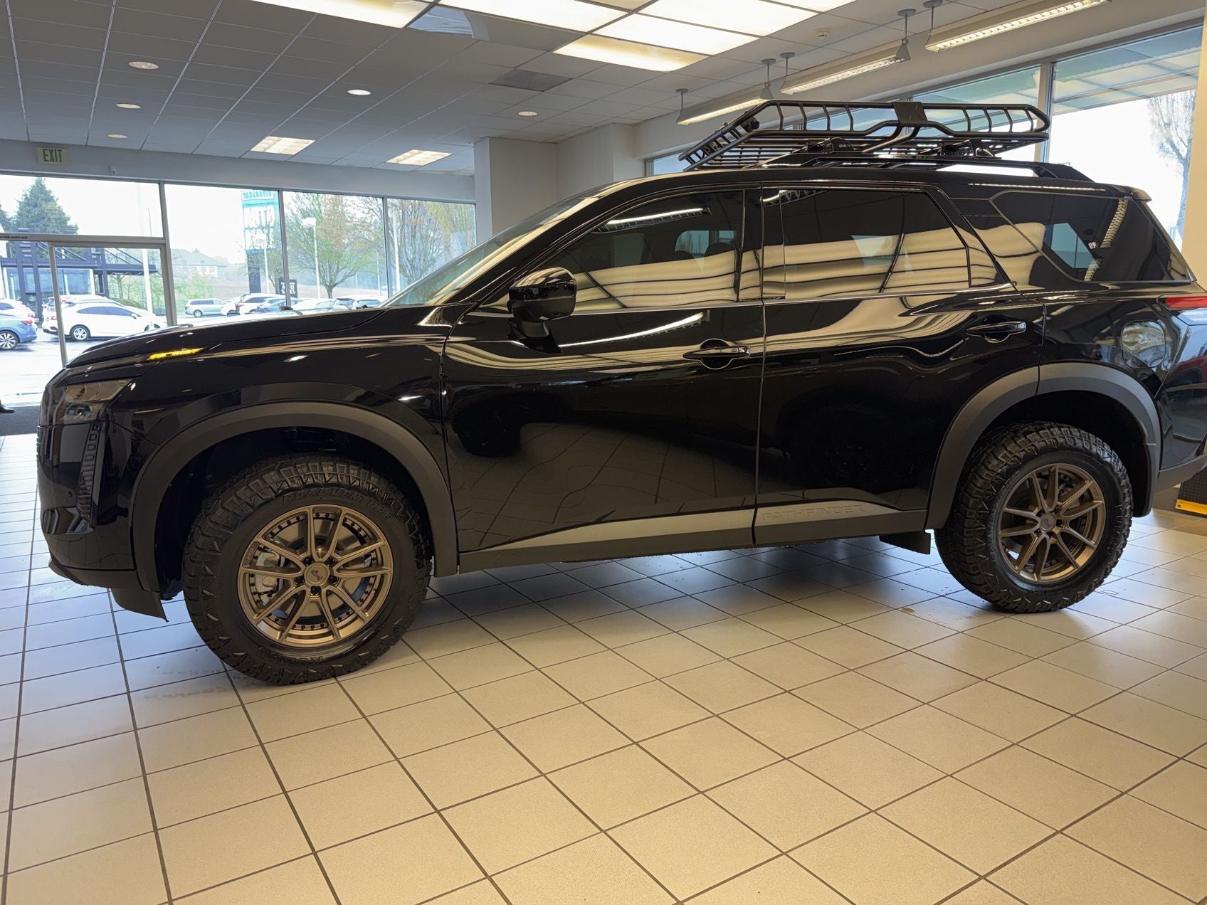 2026 Nissan Pathfinder SL "2" Lift 31" Tires 18" Wheels, Tint , Basket