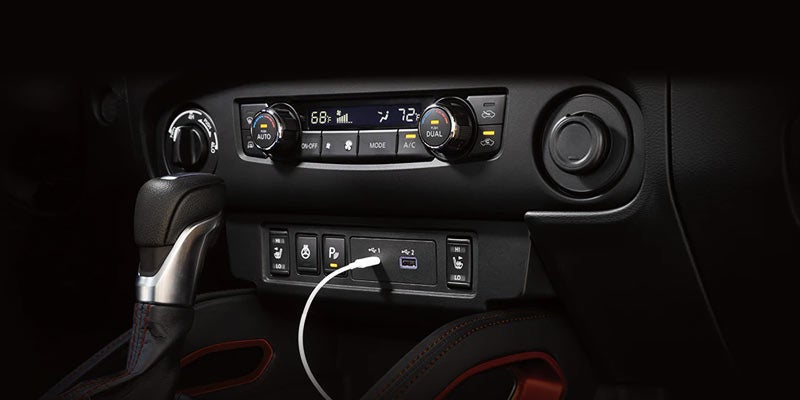 close up of the a/c and heat dashboard of the 2024 nissan frontier