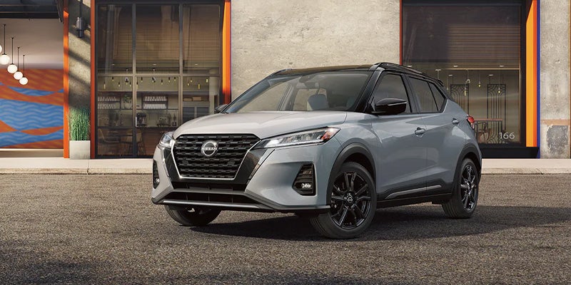 front left angle of a gray 2024 nissan kicks parked