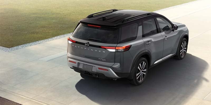 right angle rear view of a gray 2024 nissan pathfinder parked