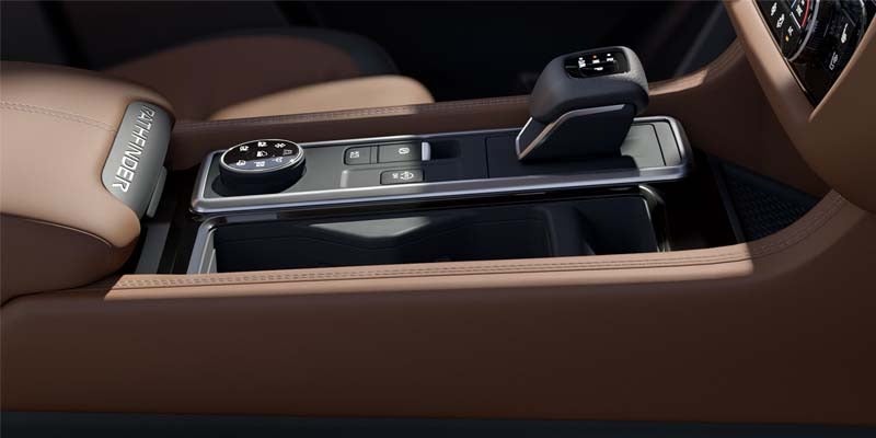 right hand view of the leather center console and transmission of the 2024 nissan pathfinder