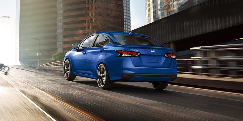 rear view of blue 2024 nissan versa